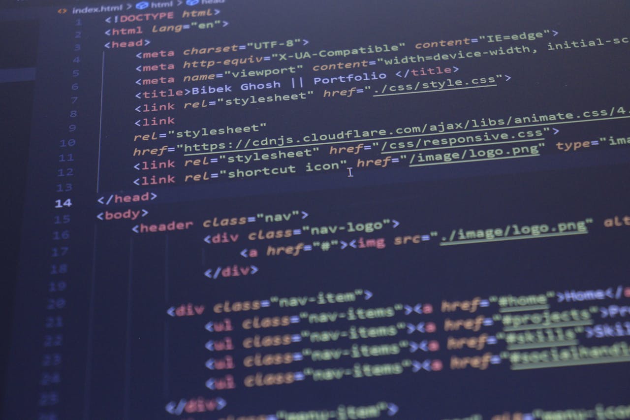 Services Close-up view of HTML and CSS code displayed on a computer screen, ideal for programming and technology themes.
